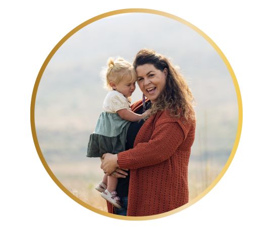Smiling mom holding her baby